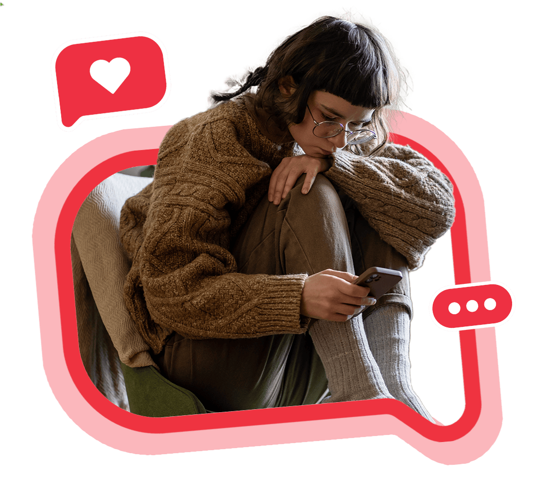 Young woman concerned looking at her phone reaching out to Crisis Text Line by texting HOME to 741741.